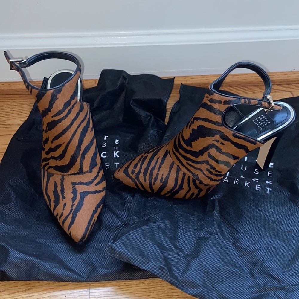 Selling brand new, never worn, animal printed heels.